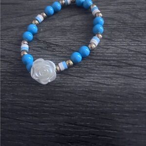 Blue and White Beaded Bracelet with Rose Accent
